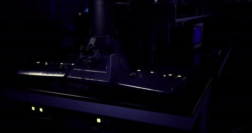 Advanced Laboratory Equipment is Illuminated in Dark Research Facility