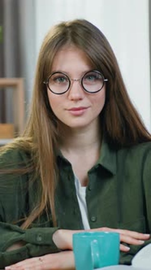 Smiling Woman in Glasses Portrait at Indoor Location