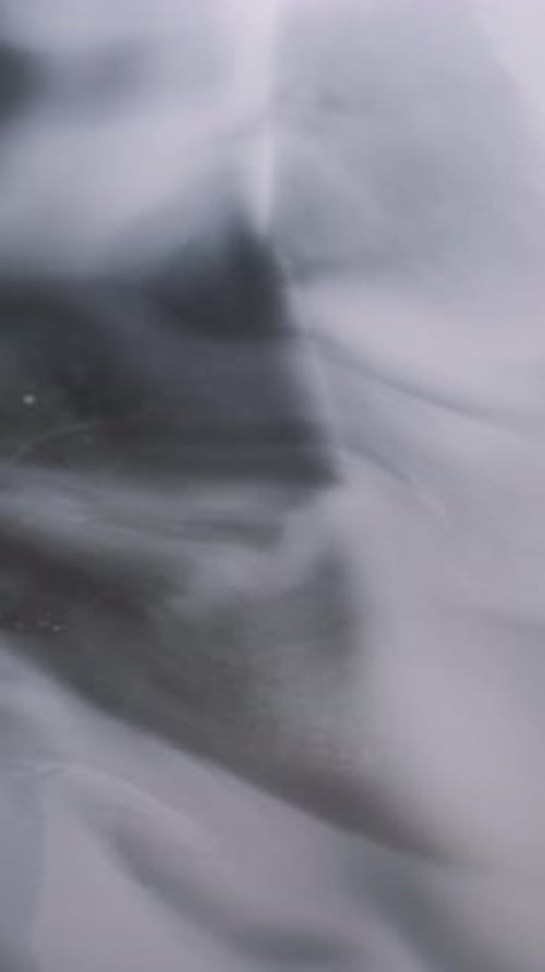 Moving Light and Dark Abstract Liquid Background