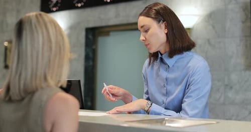 Documents with Welcome at Hotel Concierge and Business Trip with Discussion for Check in Man and