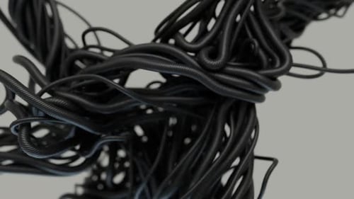 Close-Up View Of Numerous Flexible Black Cords