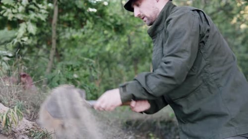 An engineering soldier digs a trench with a shovel to protect himself from enemy attack.