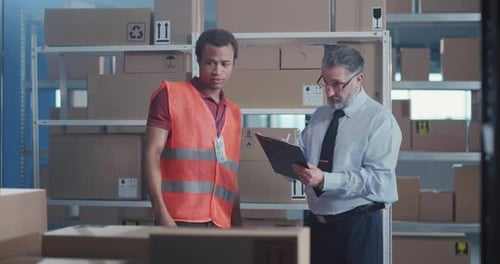 MultiRace Male Couple Cooperating in Storage Room of Post Office Direcrot Business Adult Singing