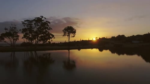4k drone footage of a sunset by the lake
