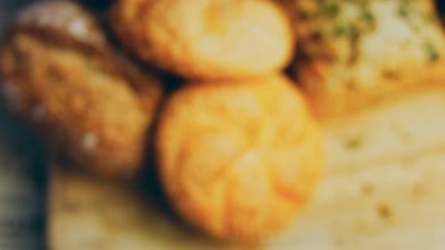 Close Up of Fresh Bread on Wooden Surface