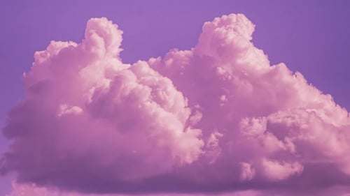 Pink Cumulus Clouds on Violet and Pink Sky