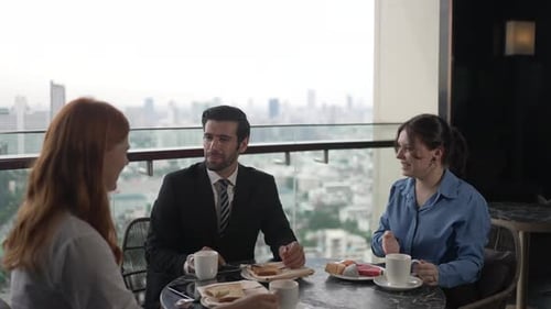 White collar worker meeting at high rise tower.