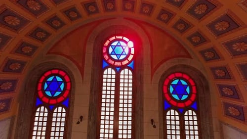 An exquisite FPV drone shot showcasing the intricate interior architecture of a historic synagogue