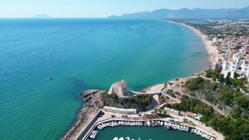 Bay with boats and Torre Truglia tower in Sperlonga