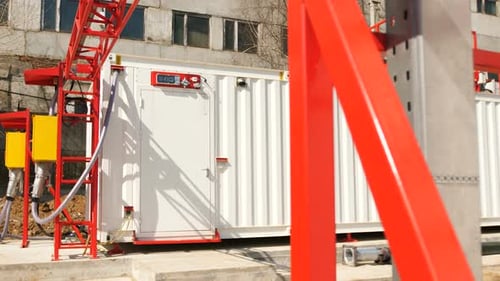 Motion Past Mining Farm Equipped in Container Against Plant