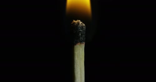 Macro shot of a match that is access. Concept: passion, power, sportiness, engines, aggression and