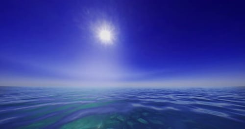Vaste océan bleu sous un soleil éclatant par temps clair