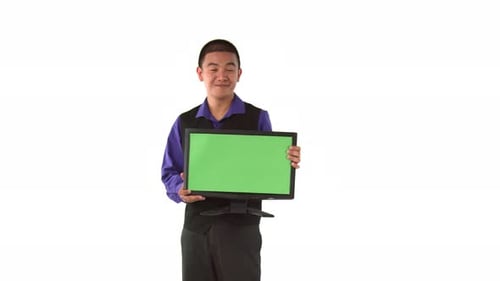 Young Adult Holds a Green Screen Computer Monitor