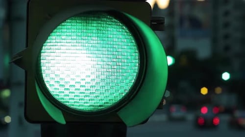 Green Traffic Light in the City at Night. 4K.