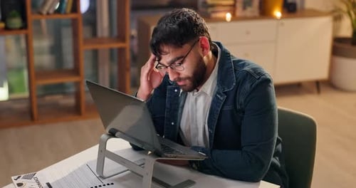 Headache, tired and business man with pain in office on deadline, financial crisis