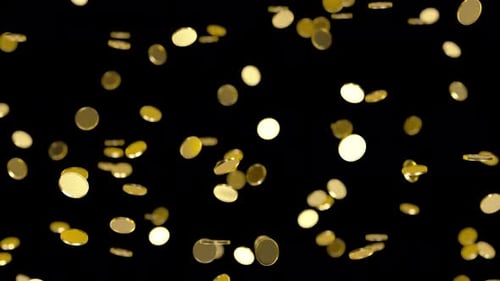 Golden coins falling, alpha channel.