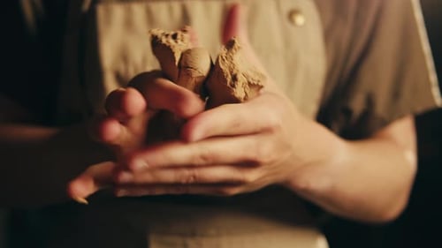 Woman Potter Works with Clay on Master Class in Studio Working Process in Ceramic Workshop Potter