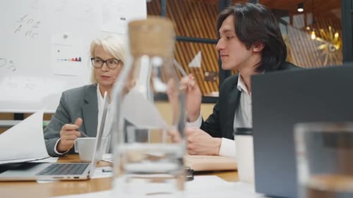 Business Team Meeting at Conference Table