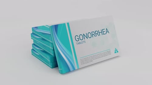Comprimés contre la gonorrhée dans une boîte à médicaments
