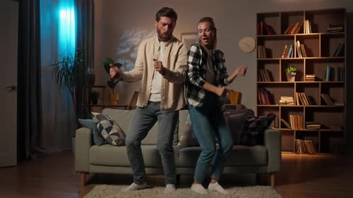 Couple Dancing and Having Fun at Home
