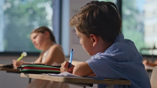 Group Schoolchildren Sitting Desks Writing Task Closeup Elementary School Class