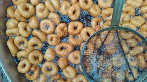 Delicious Traditional Turkish Dessert Lokma Donut Dough Cooking In Oil 23