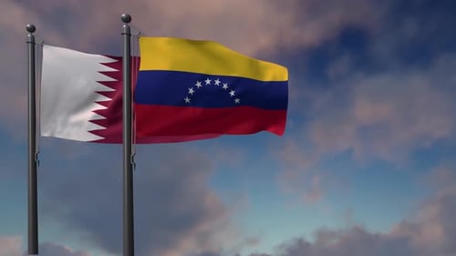 Qatar and Venezuela National Flags Waving Against Blue Sky