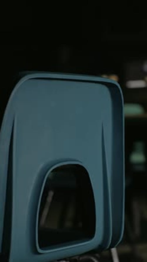 A Row of Blue Chairs Sitting Next to Each Other