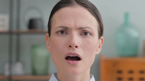 Close up of Shocked Woman at Home