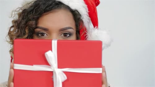 Woman with Gift and Santa Hat