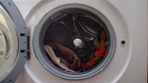 Clothes Spinning Inside Washing Machine