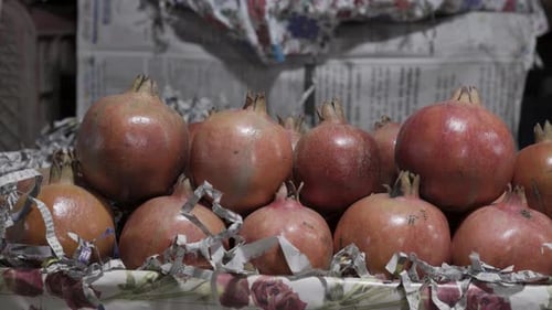 fresh pomegranate at fruit store for sale at evening