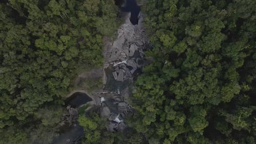 Topdown Of Babinda Boulders Natural Pool Amidst Dense Trees In Far North Queensland, Australia. Aeri