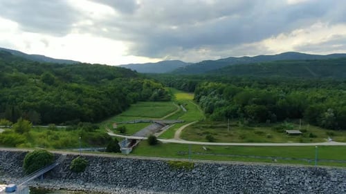 Lake Butoniga Croatia aerial view of water canal tributary and retaining wall, drone flyover shot