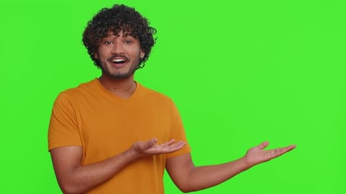 Indian Man Showing Thumbs Up Pointing Empty Place Advertising Area for Commercial Text Copy Space