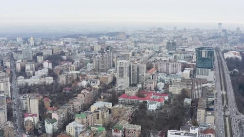 Fog City Aerial. A city covered in fog. City traffic, aerial view. Gray City Aerial. Kyiv. Ukraine