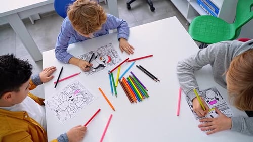 Group of School Children Draw Picture for Augmented Reality Kids in Classroom Use Pencils Prepare