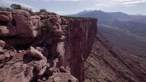 Rugged vertical rock cliff in Castle Valley near Moab Utah, Adobe Mesa