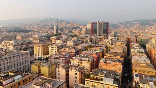 Genoa city skyline aerial view- rooftops and urban landscape in morning light