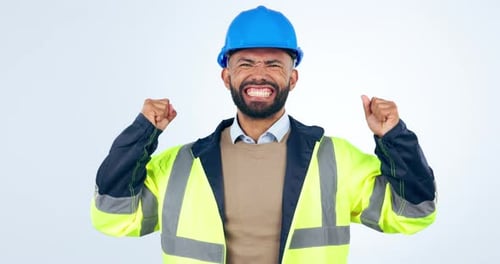 Excited Construction Worker Pumping Fists in Celebration