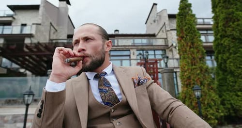 man in suit smoking cigarette Serious Near Free Stock Photo and Image 465232194 Handsome business man smoking a