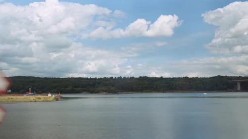 View From Train Window Travelling Along River