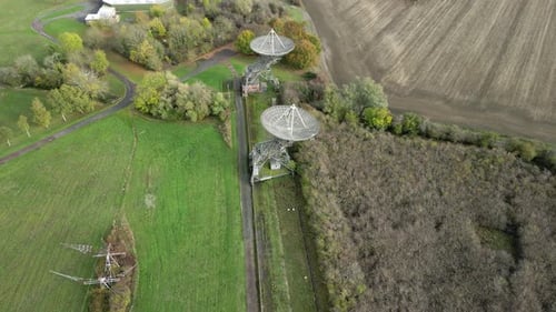 Satellite Dishes in Vast Rural Landscape Aerial Shot