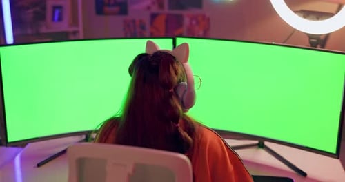 Woman, computer and green screen or gaming streaming with mockup space for subscription