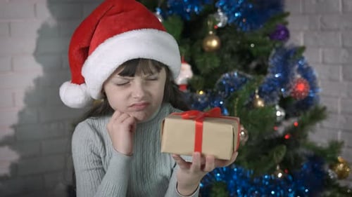 Child Unhappy Gift for Christmas Eve