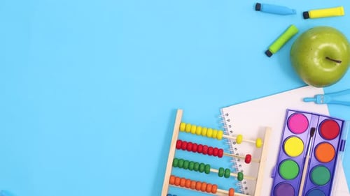 Back To School Stationery With Clock Appear On Right Side Of Blue Theme. Stop Motion