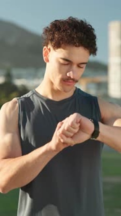 Man, click smart watch and runner in city, fitness and smile with timer, monitor or steps in summer