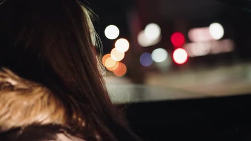 Firstperson View of a Lady Rolling Down Car Window at Night Handheld Camera