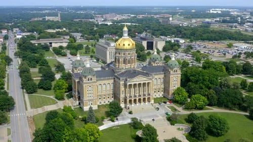 Drone view of des moines Iowa state capitol building on a sunny day in the midwest