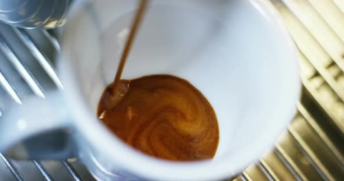 espresso coffee of the highest quality Italian made with a professional coffee machine falls into